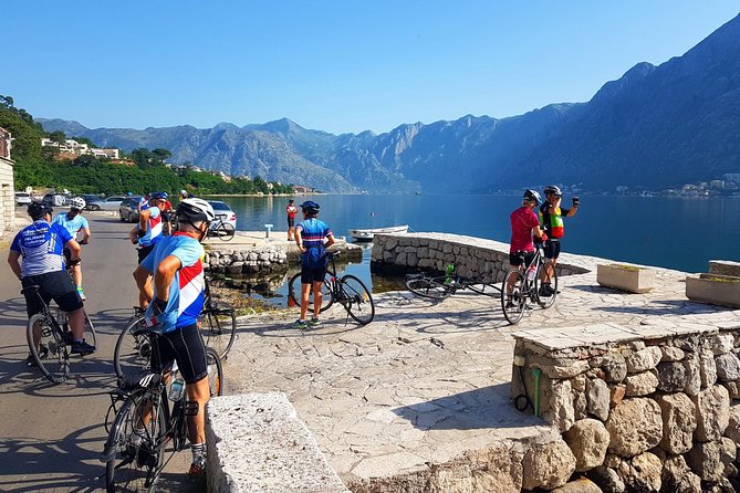 Bike tour - Kotor Bay circle and visit Our Lady of the Rock - Crossing the bay at Kamenari