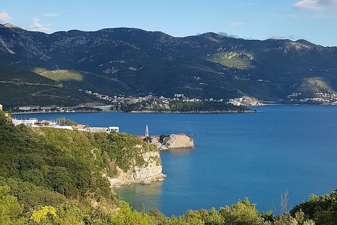 Private Transfer from Budva to Podgorica Airport and city - A Budva departure with the mountains outside your window